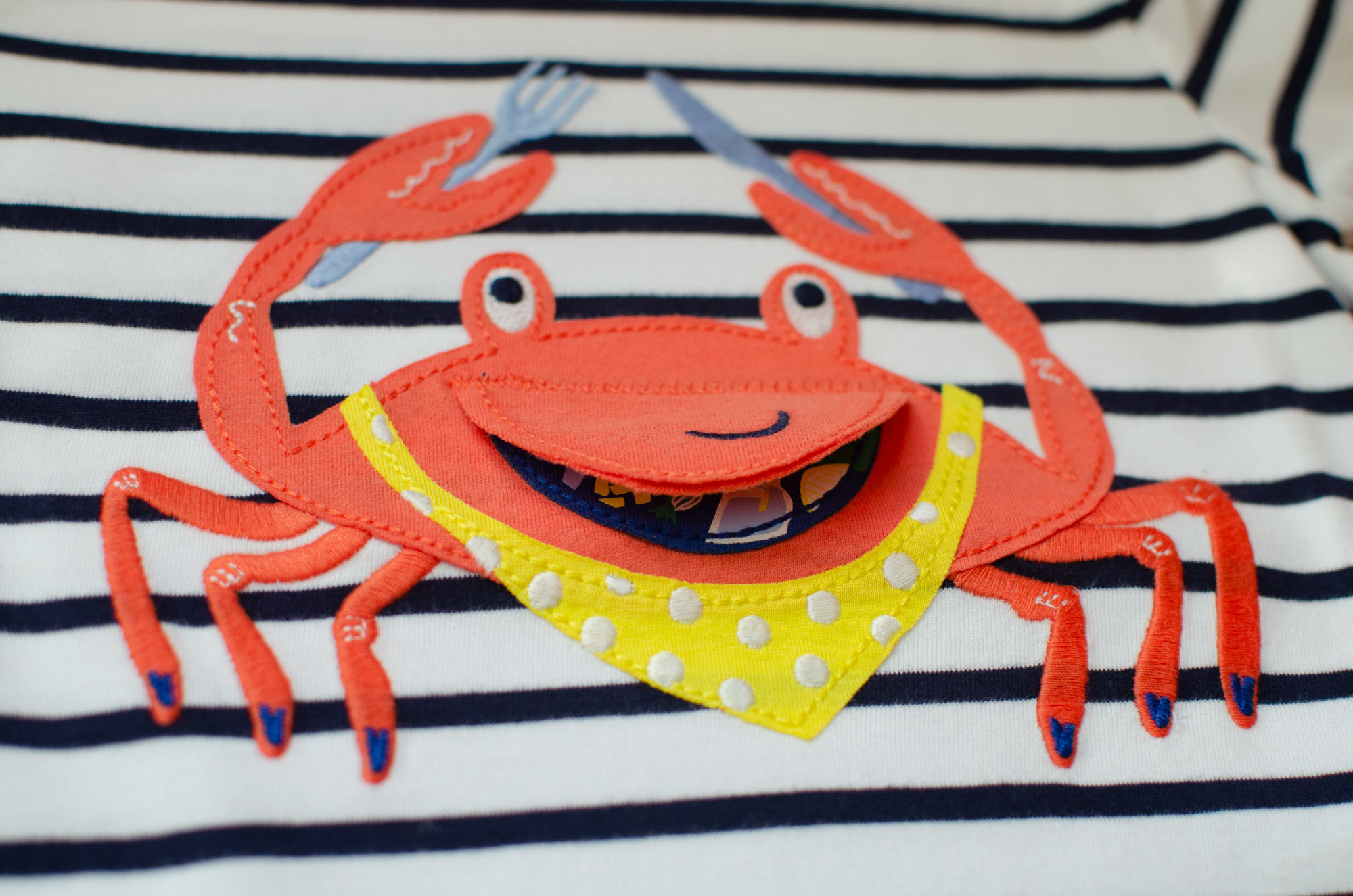 Crab chomp applique designed by Elly Jahnz for Joules Clothing